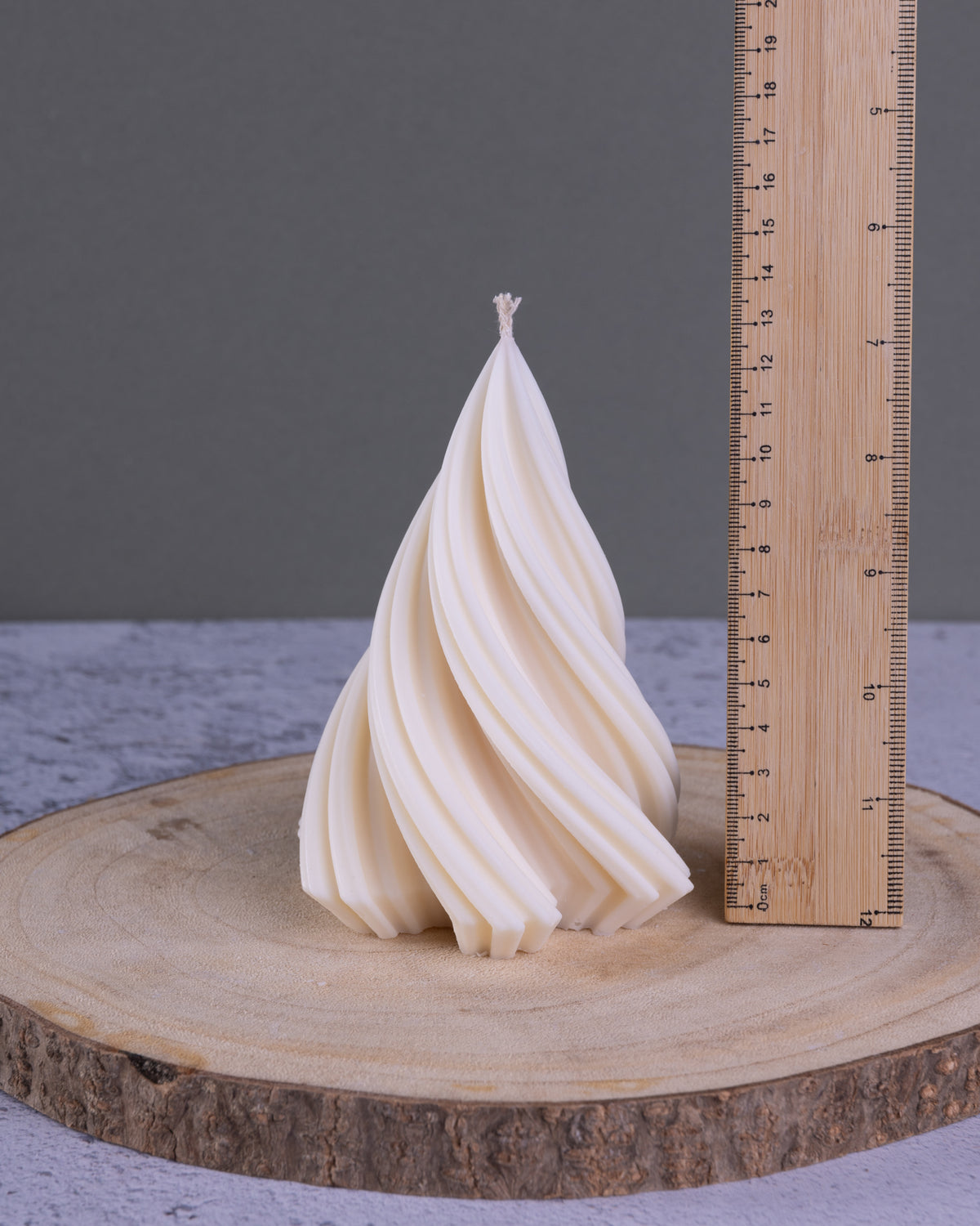 Tall sculptural twist christmas tree candle showing measurement