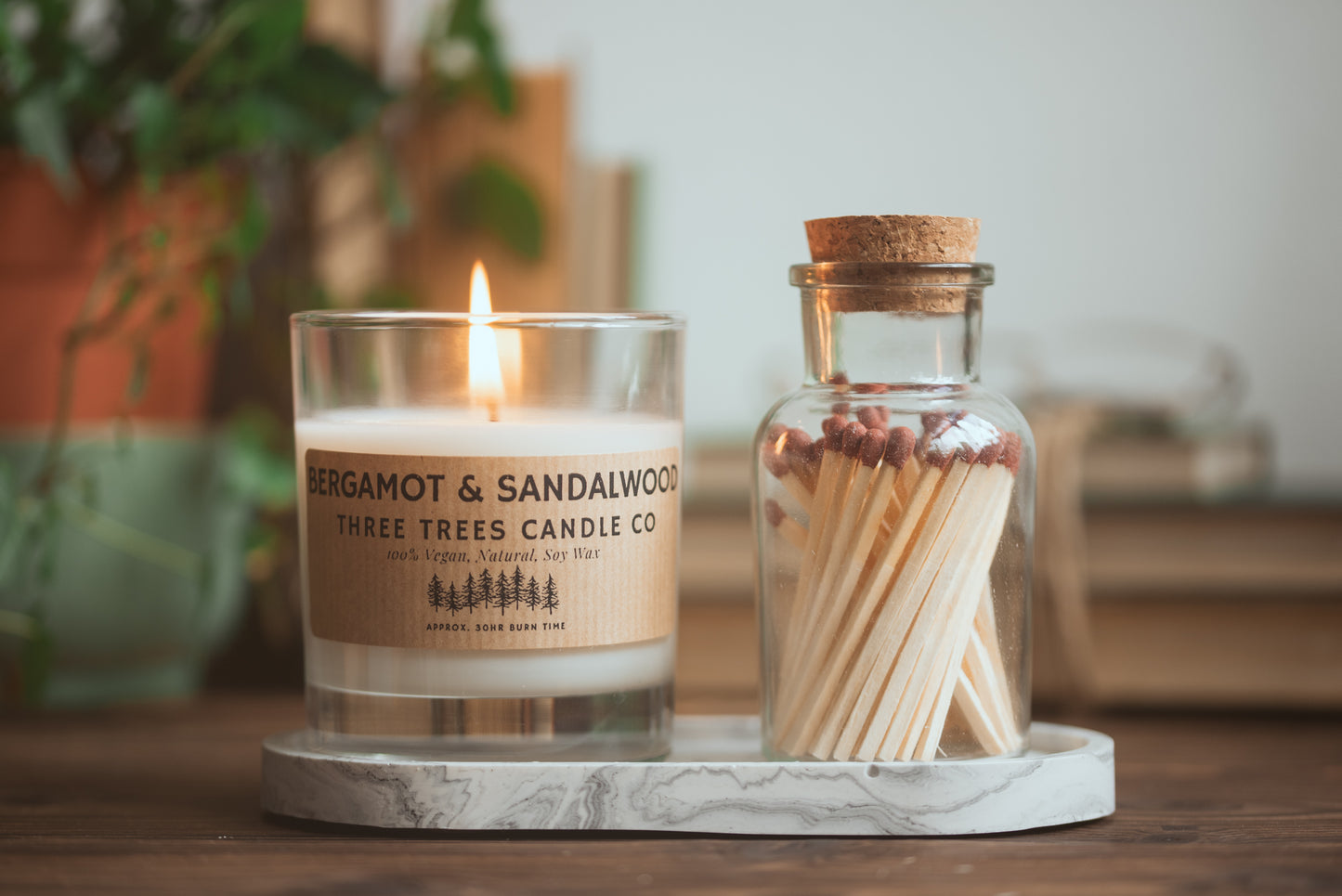 Bergamot and sandalwood scented candle with matches