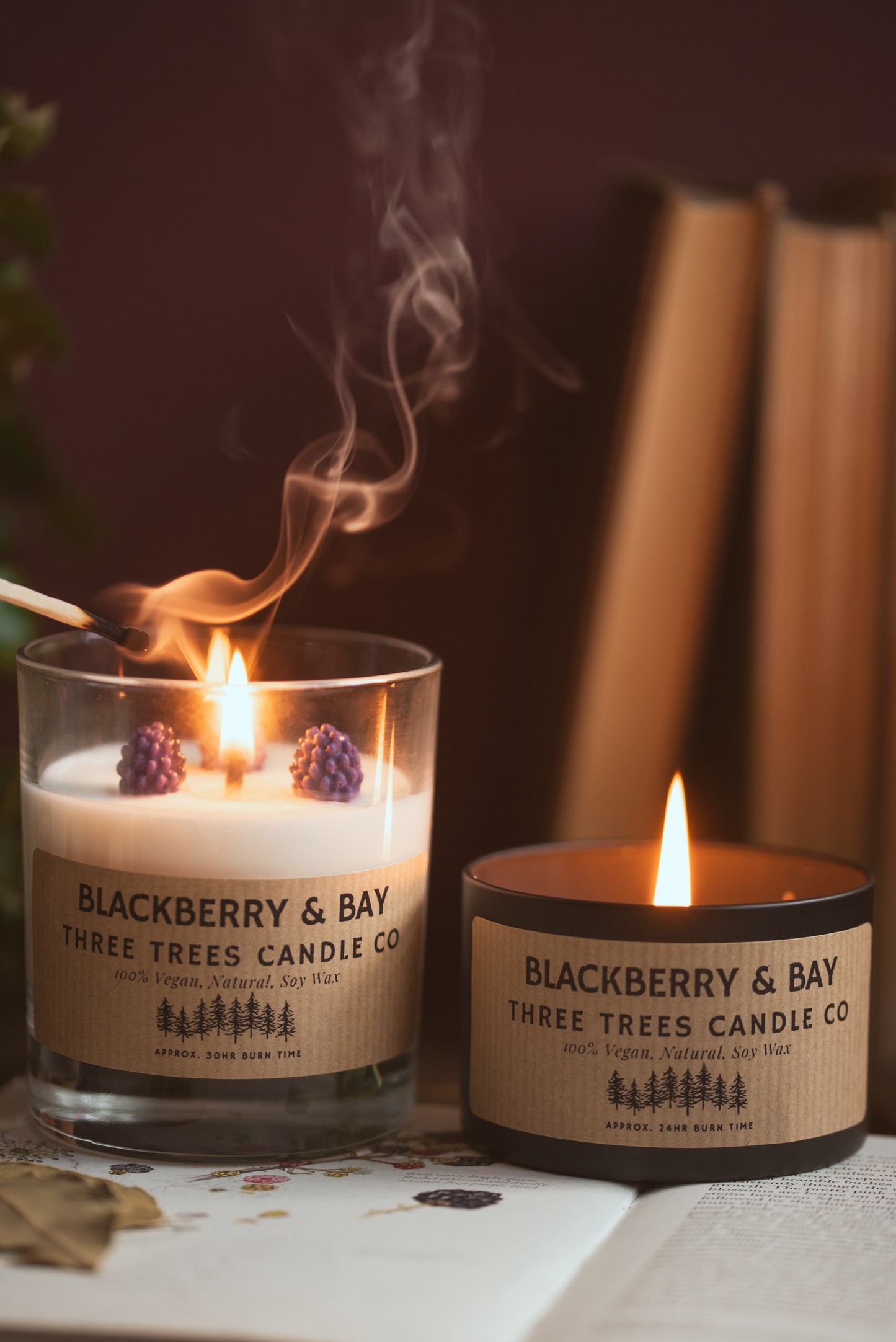 Blackberry and bay scented soy wax candle in a glass jar