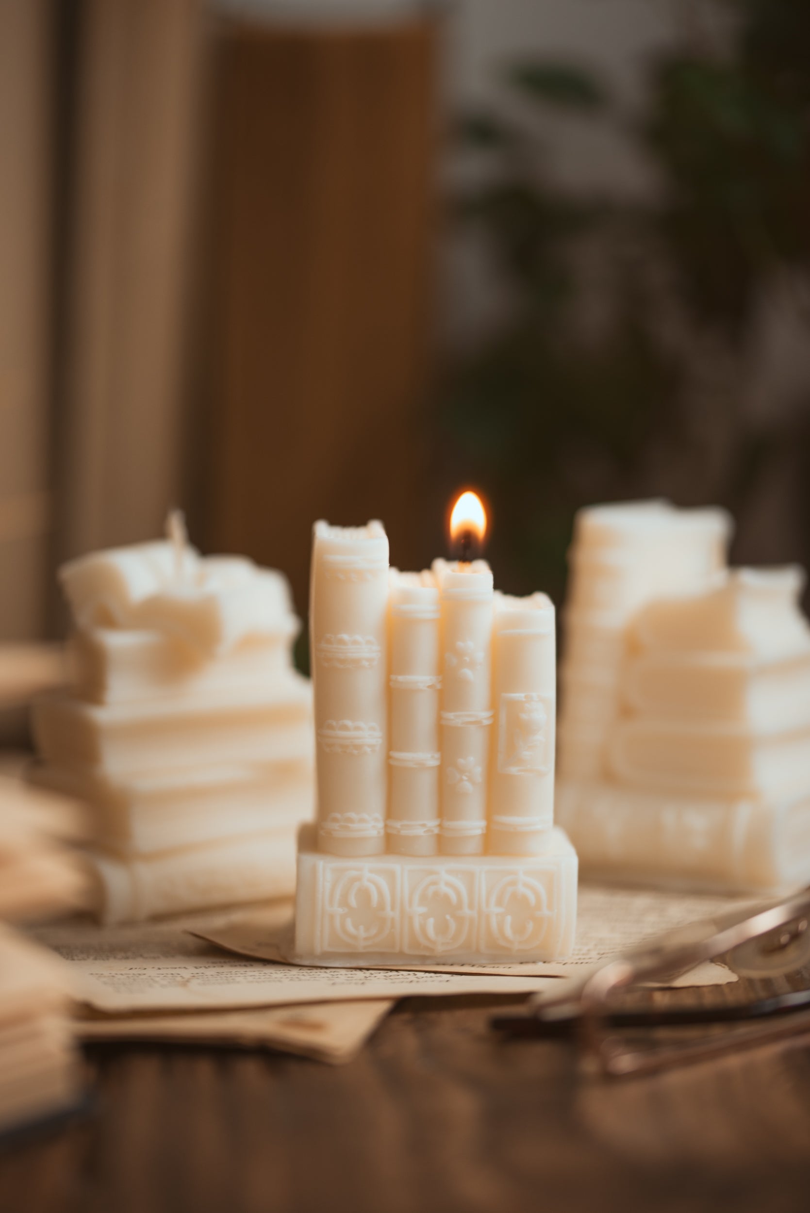 Book shaped candle burning