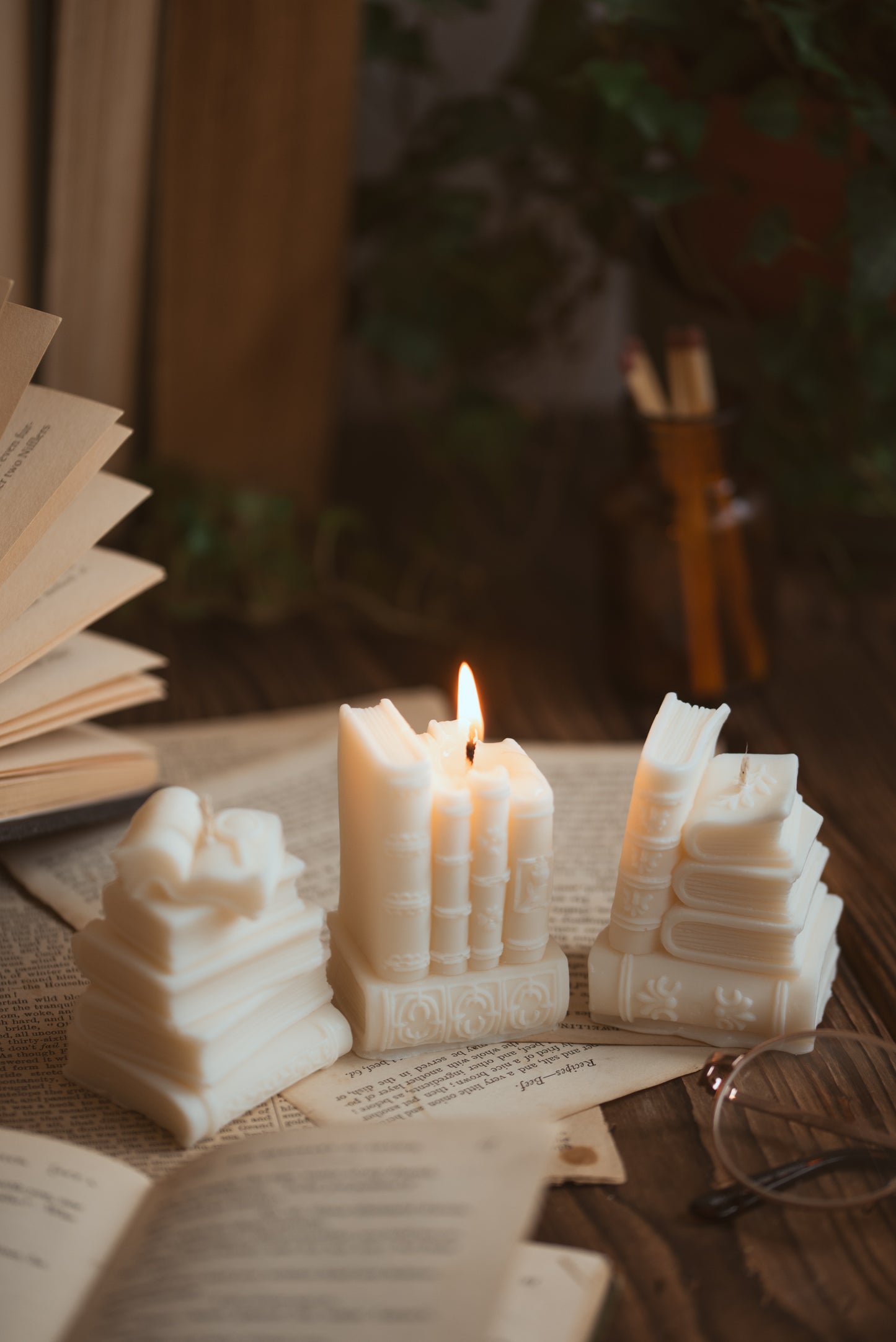 Book shaped candle styled on a desk
