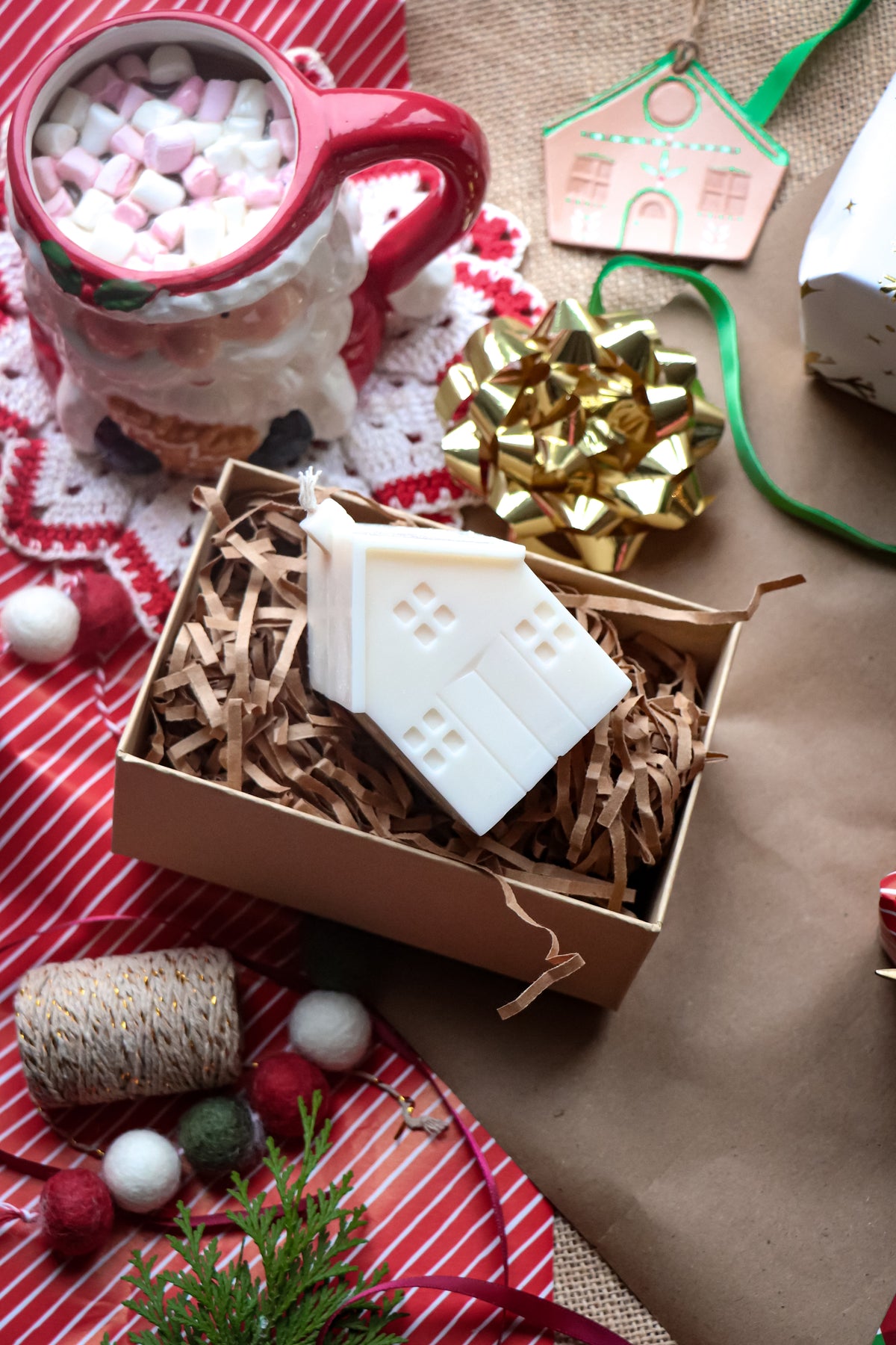 Christmas house-shaped candle in gift box perfect for festive gifting