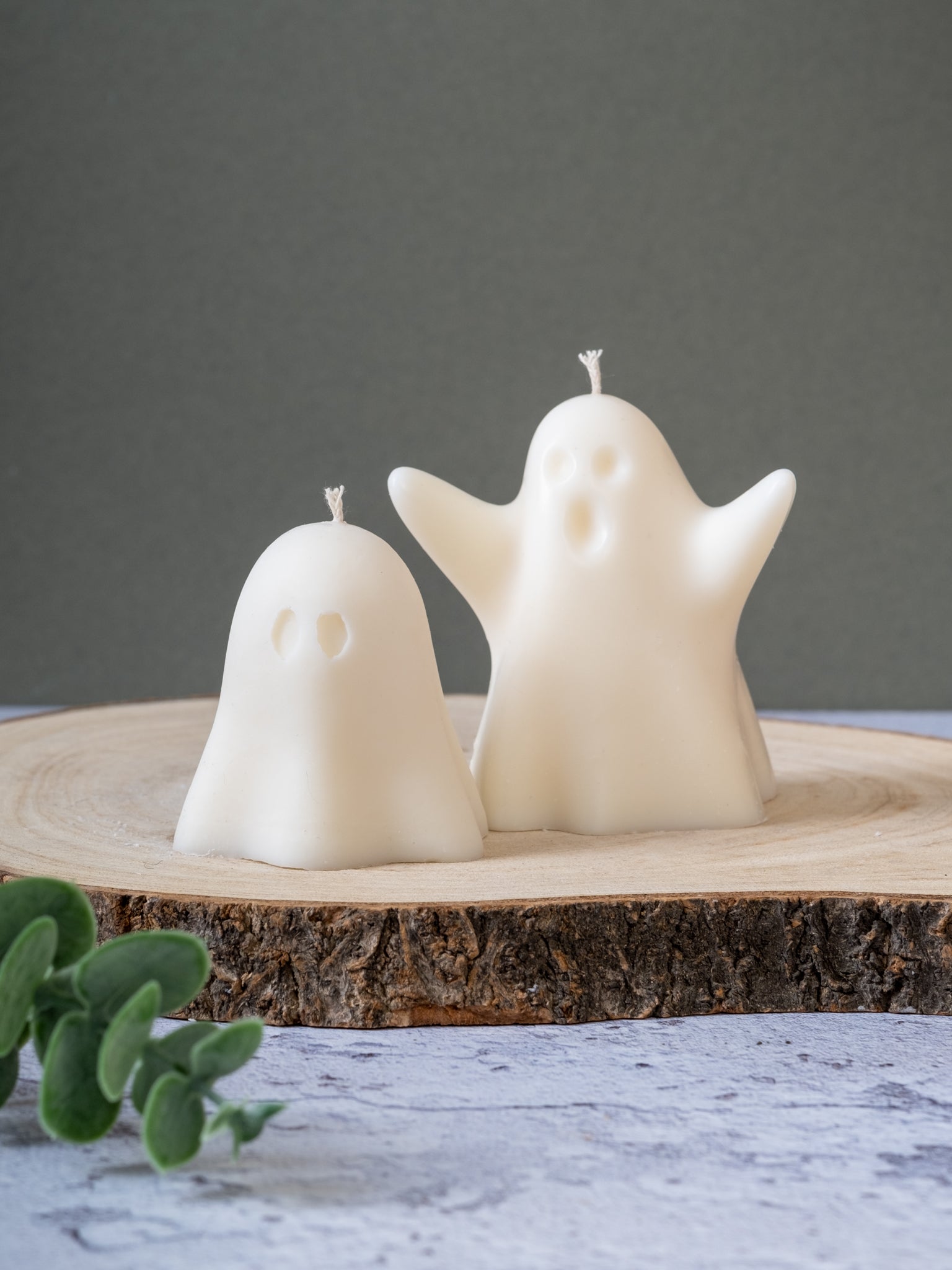 Close-up of ghost-shaped candle showing smooth wax details