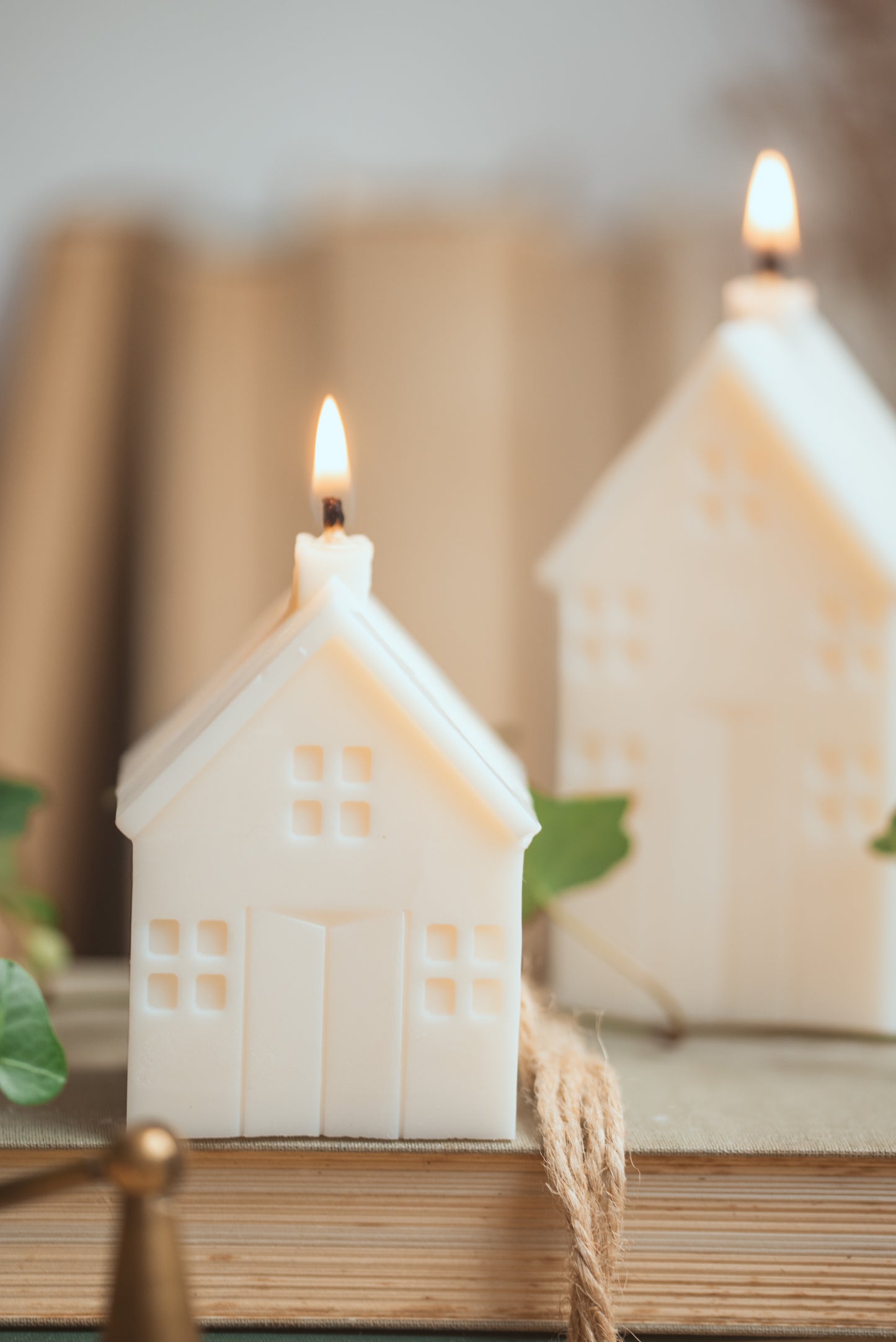 Close-up of house-shaped candle showing detailed structure