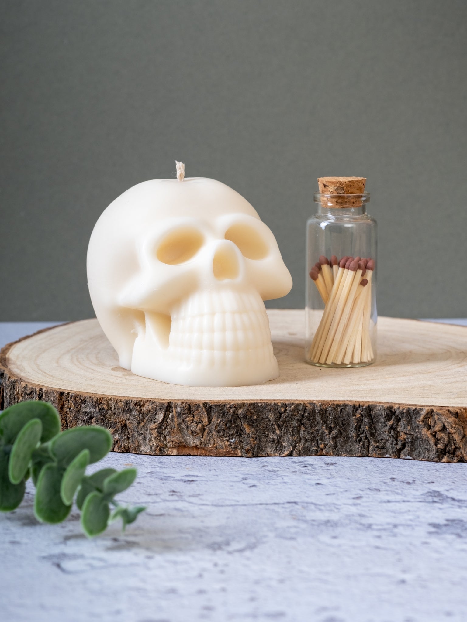 Close-up of skull-shaped candle showing detailed features