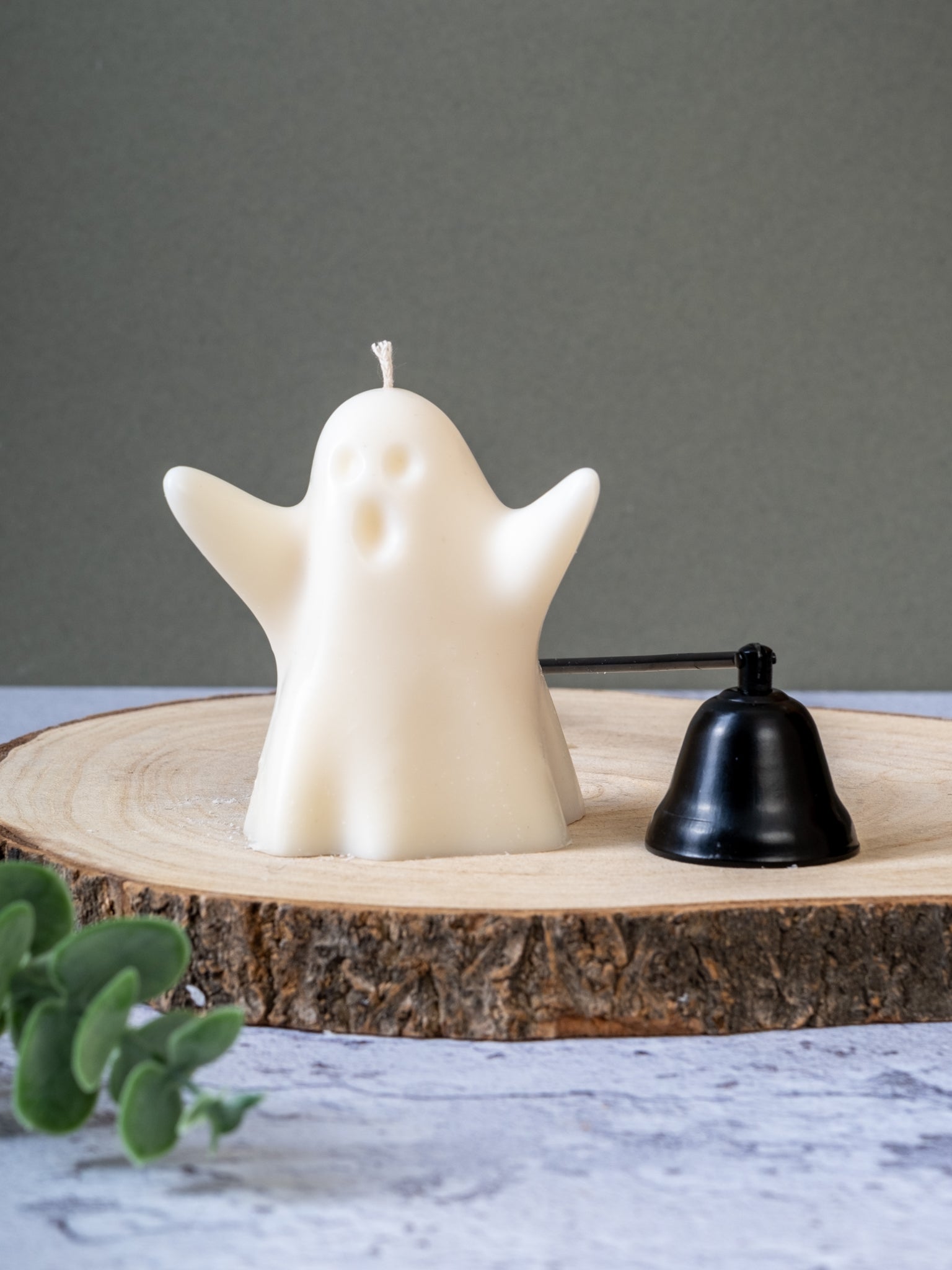 Ghost-shaped soy wax candle front view