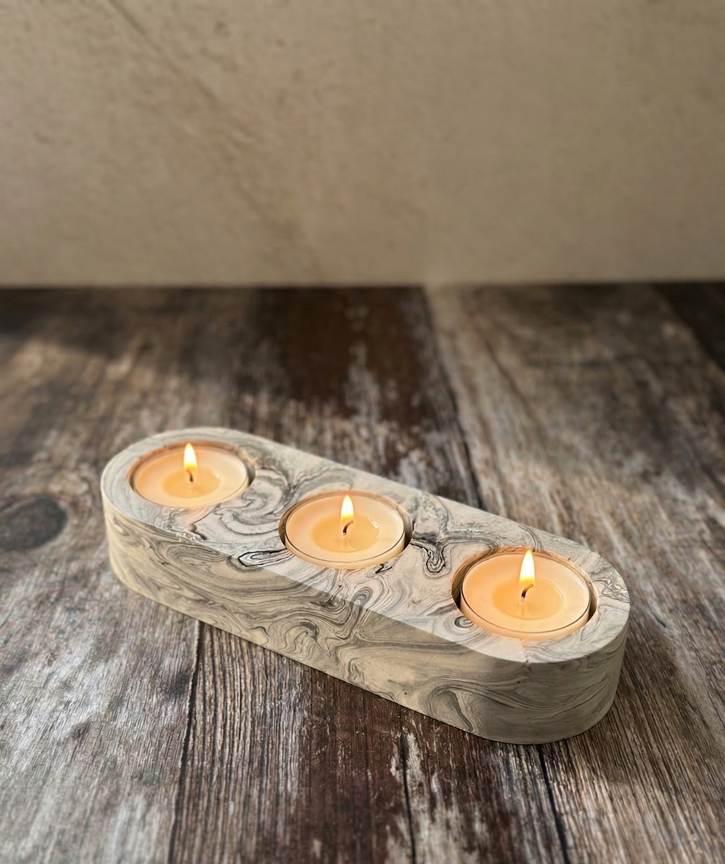 jesmonite tea light holder with lit tea lights