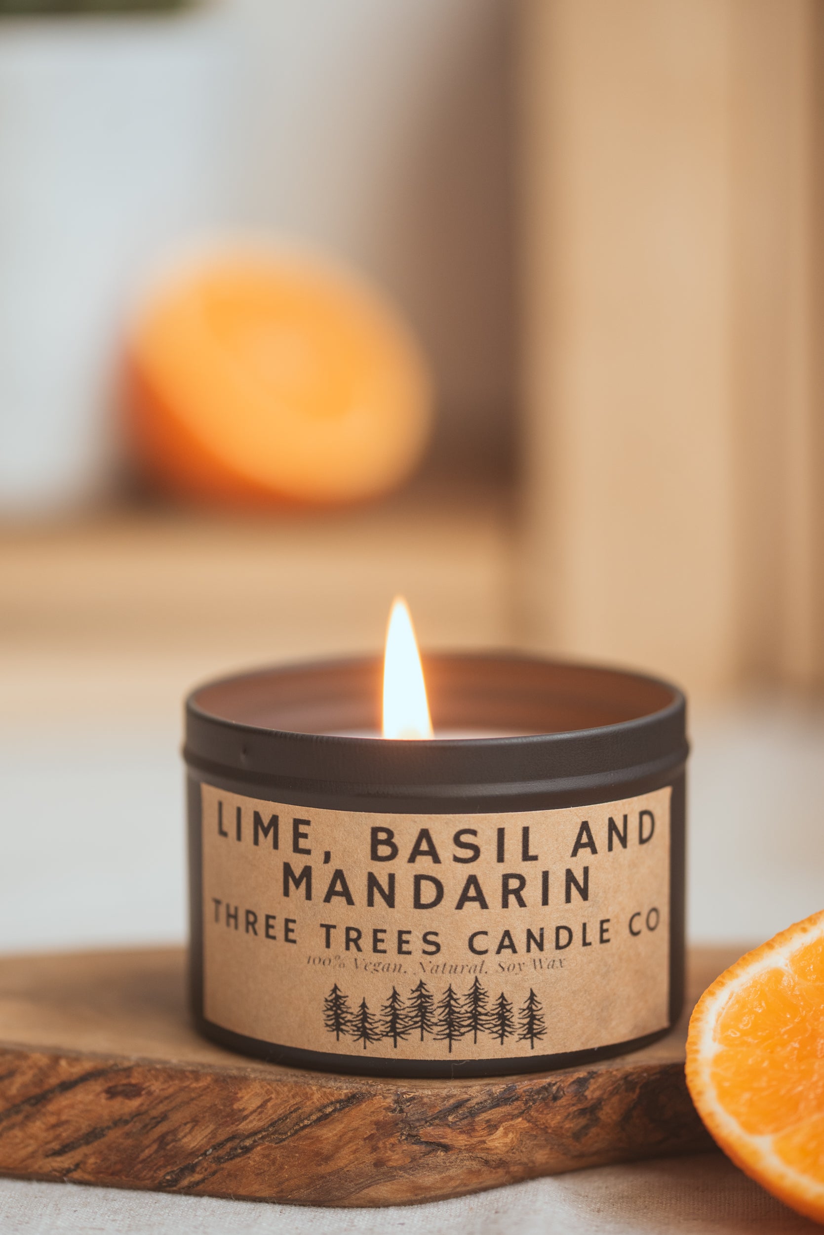 lime, basil and mandarin scented candle travel tin