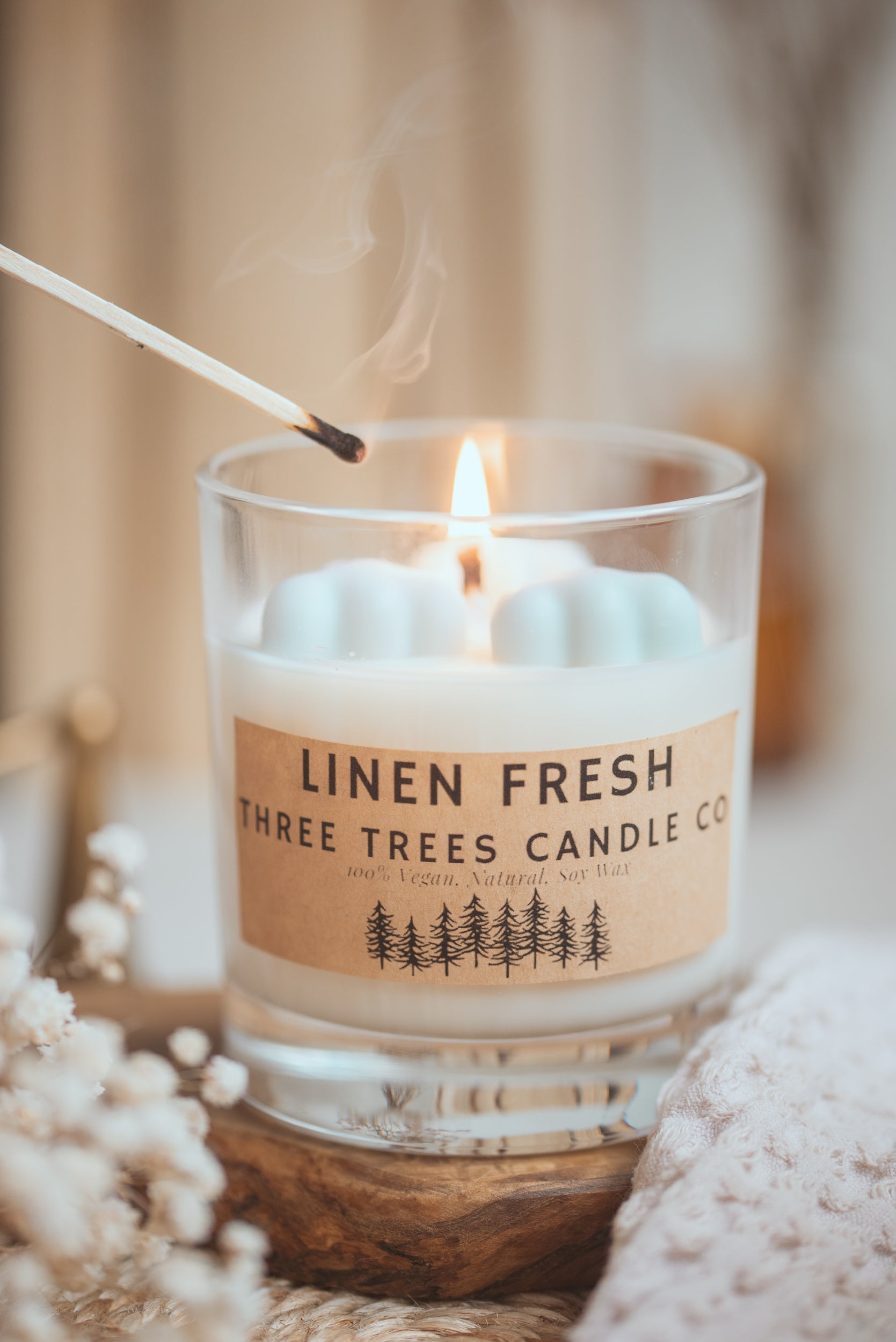 linen fresh scented candle in glass jar