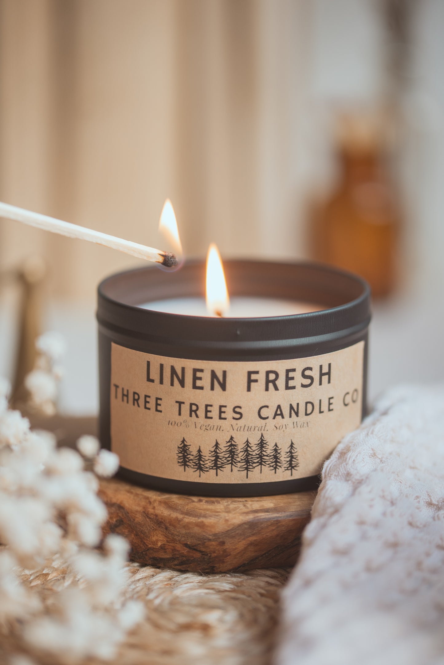 linen fresh scented candle in black tin