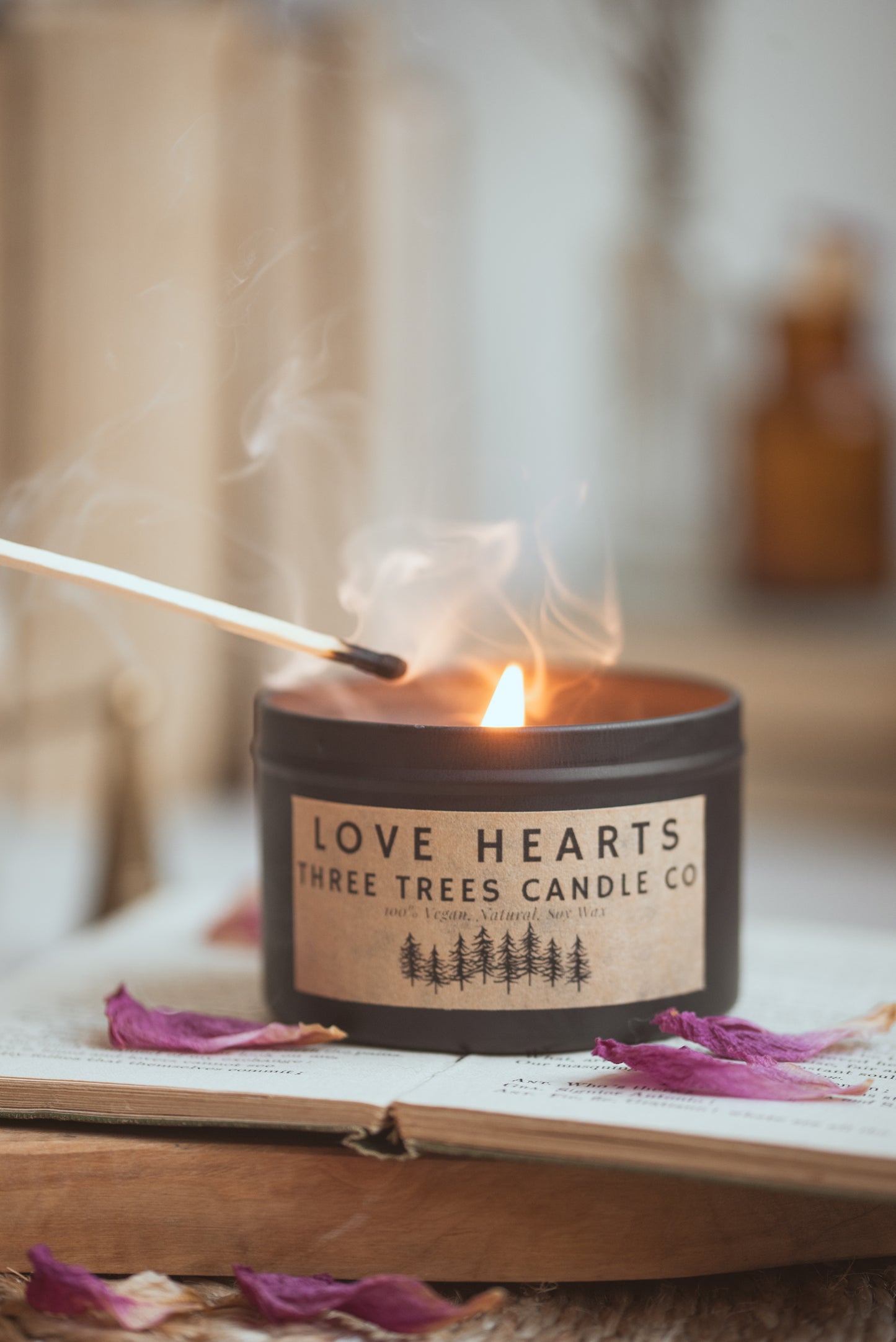 Lit Love Hearts soy candle creating warm romantic ambiance