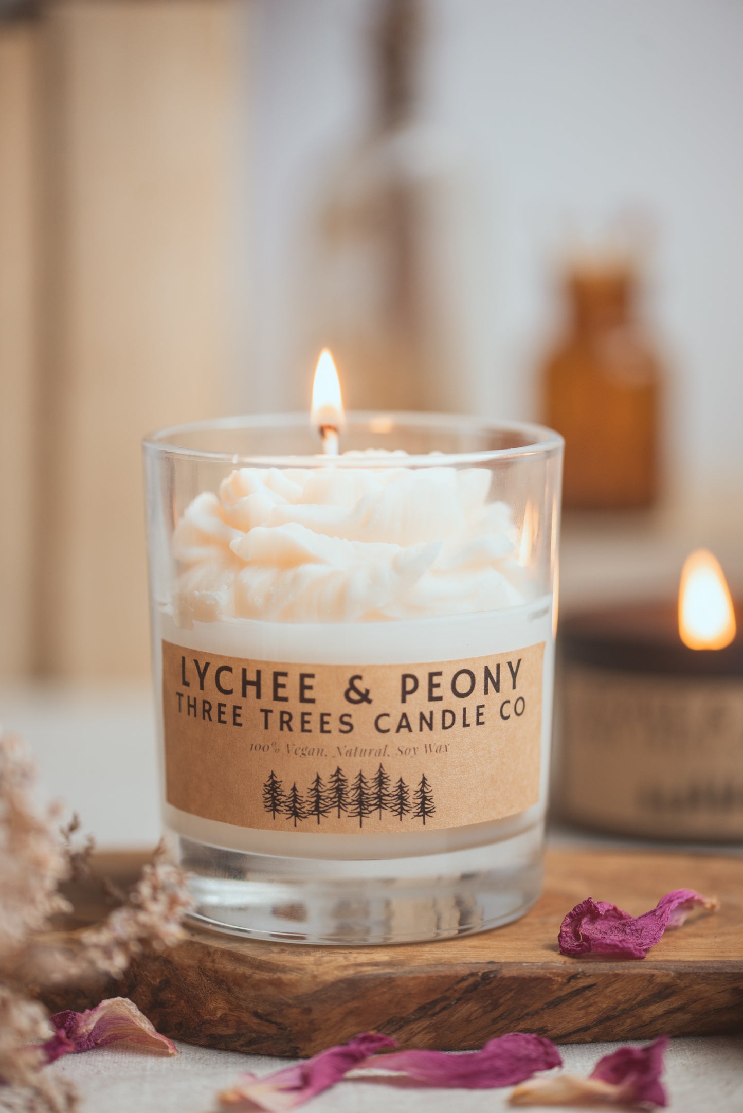 Lit Lychee & Peony soy candle creating fruity and floral ambiance