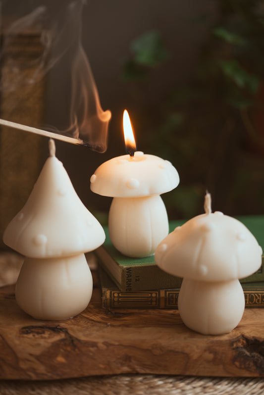 Mushroom-shaped soy wax candle with rounded cap and natural base