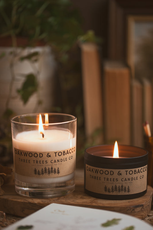 Oakwood and Tobacco soy wax candle in amber glass jar