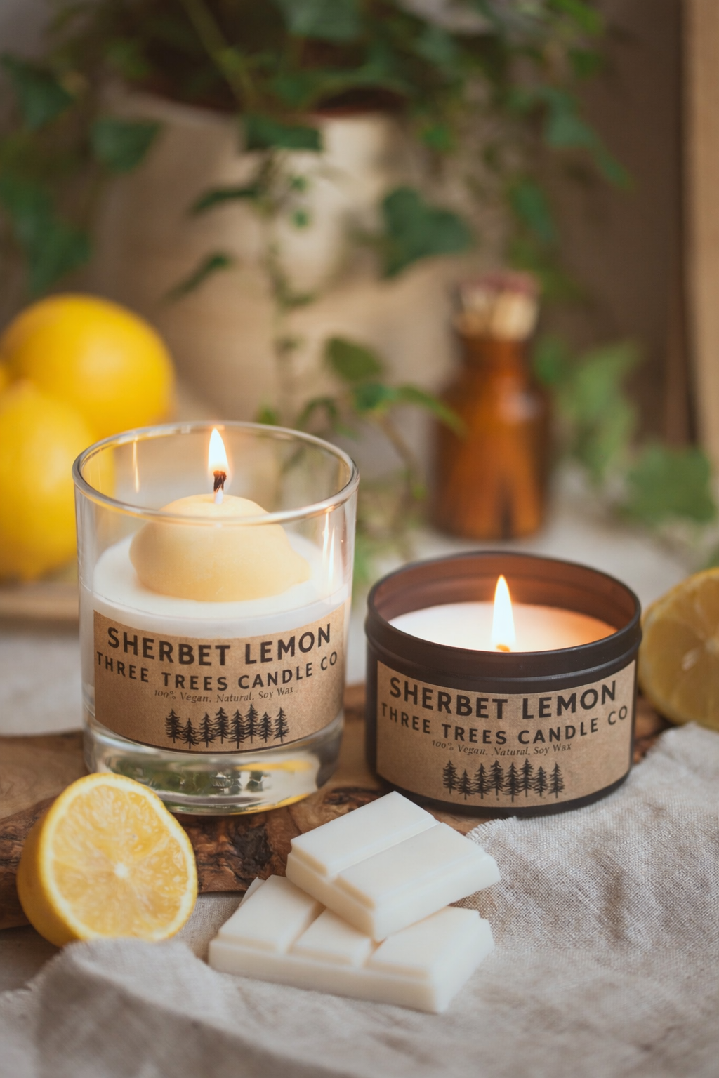 sherbet lemon scented candle in glass and tin