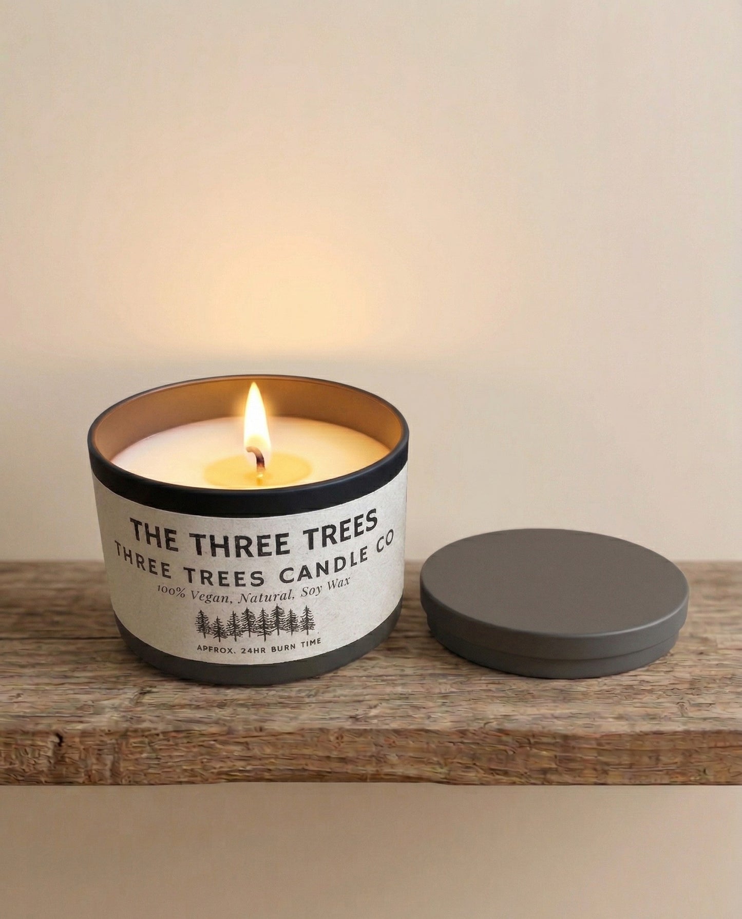 the three trees scented tin candle