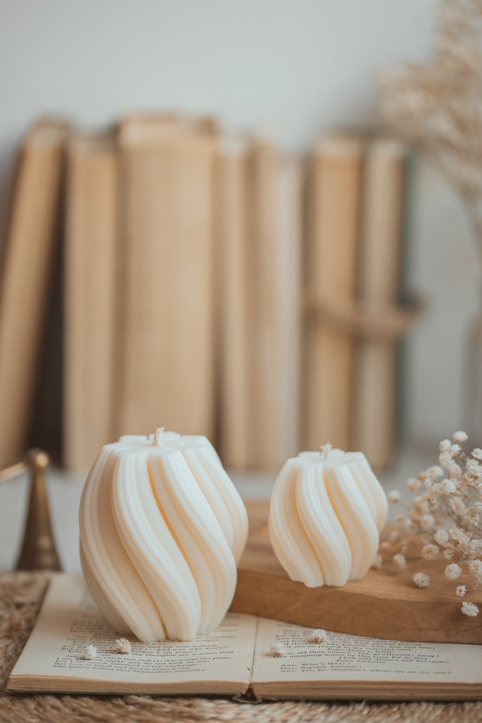 Twist-shaped candle styled on table as modern home decor