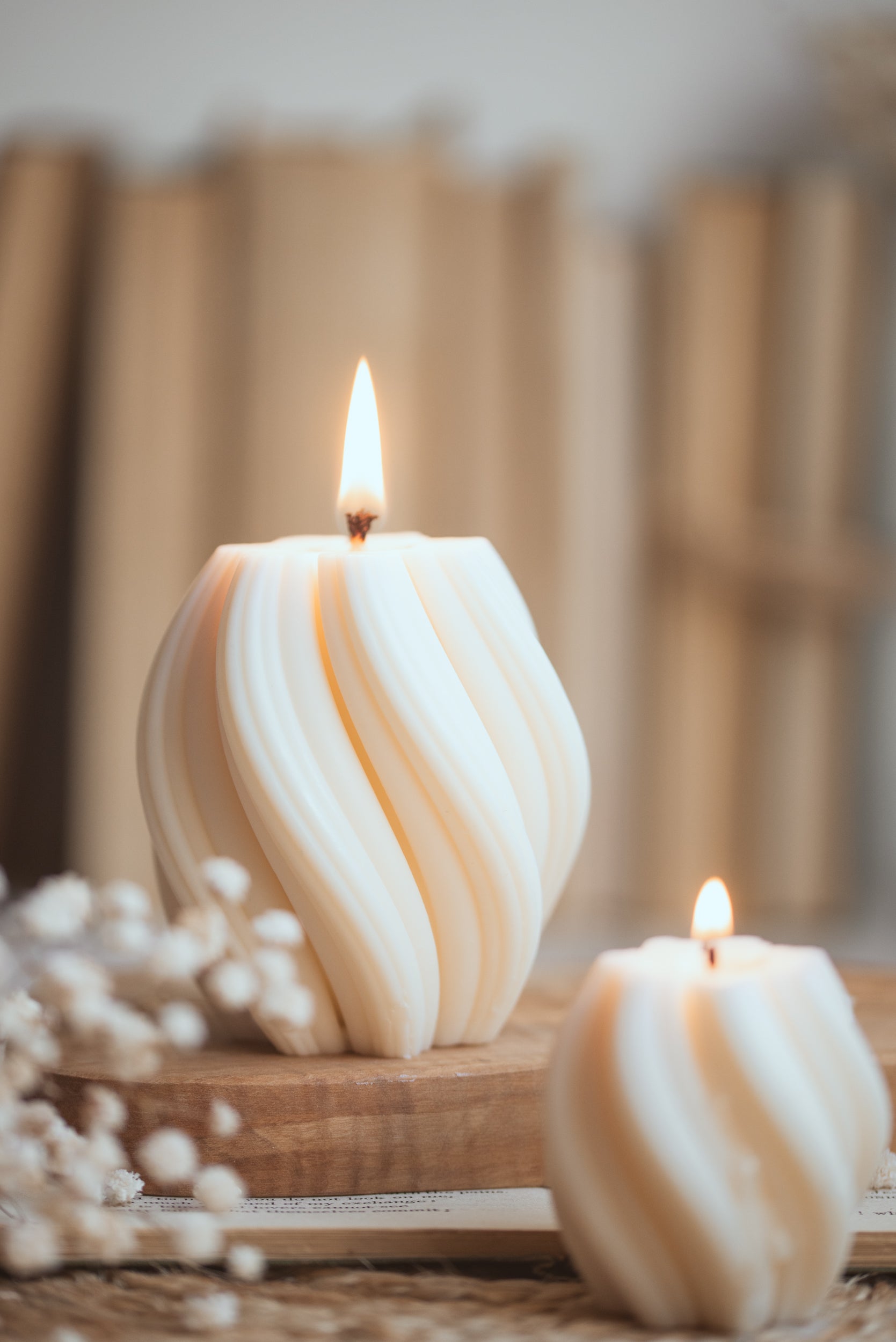Twist-shaped soy wax candle with elegant sculptural design