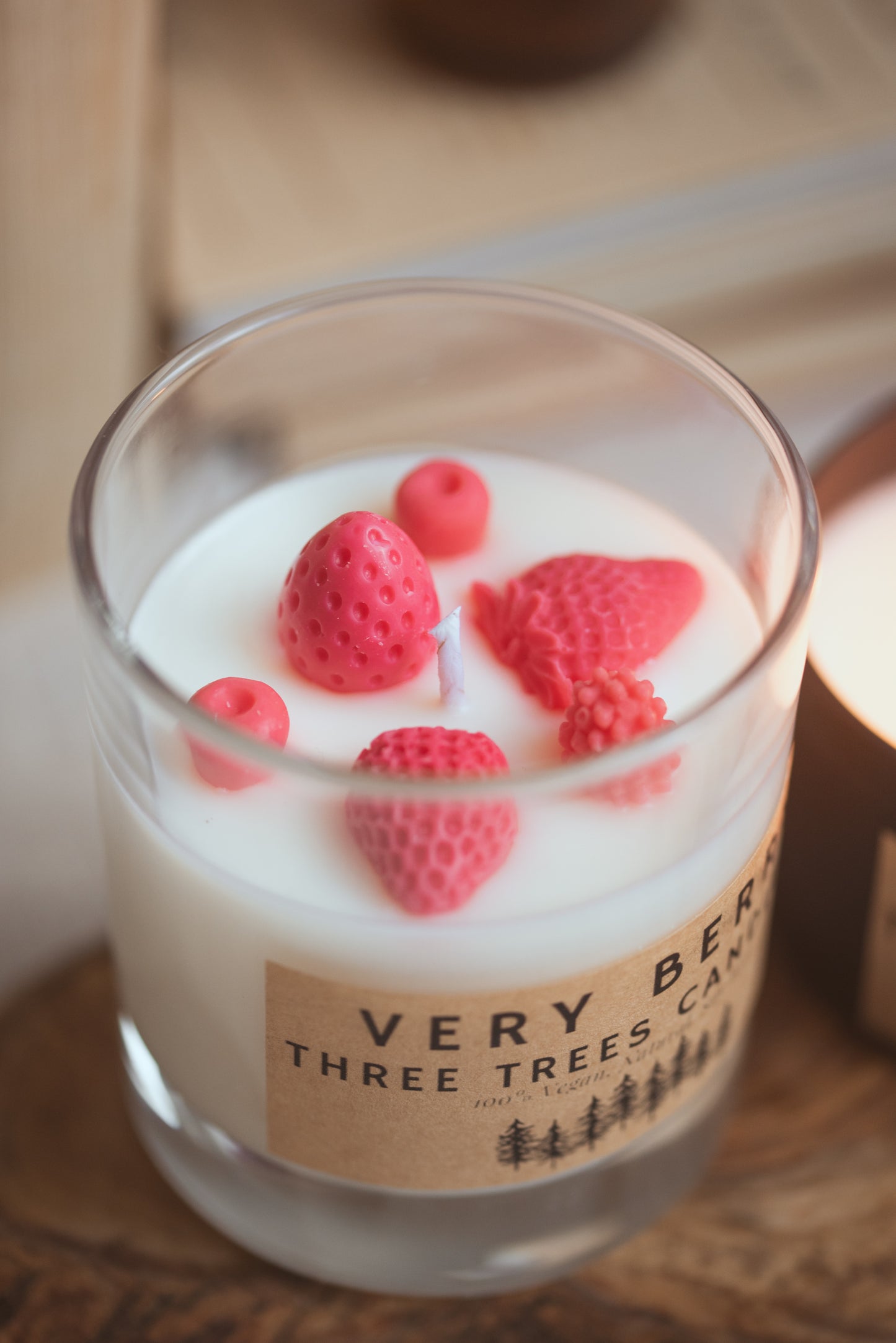 Close-up of very berry scented candle