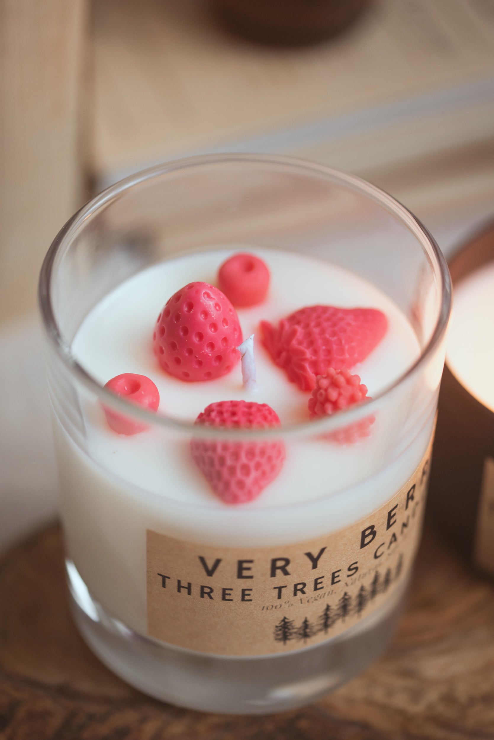 Close-up of very berry scented candle