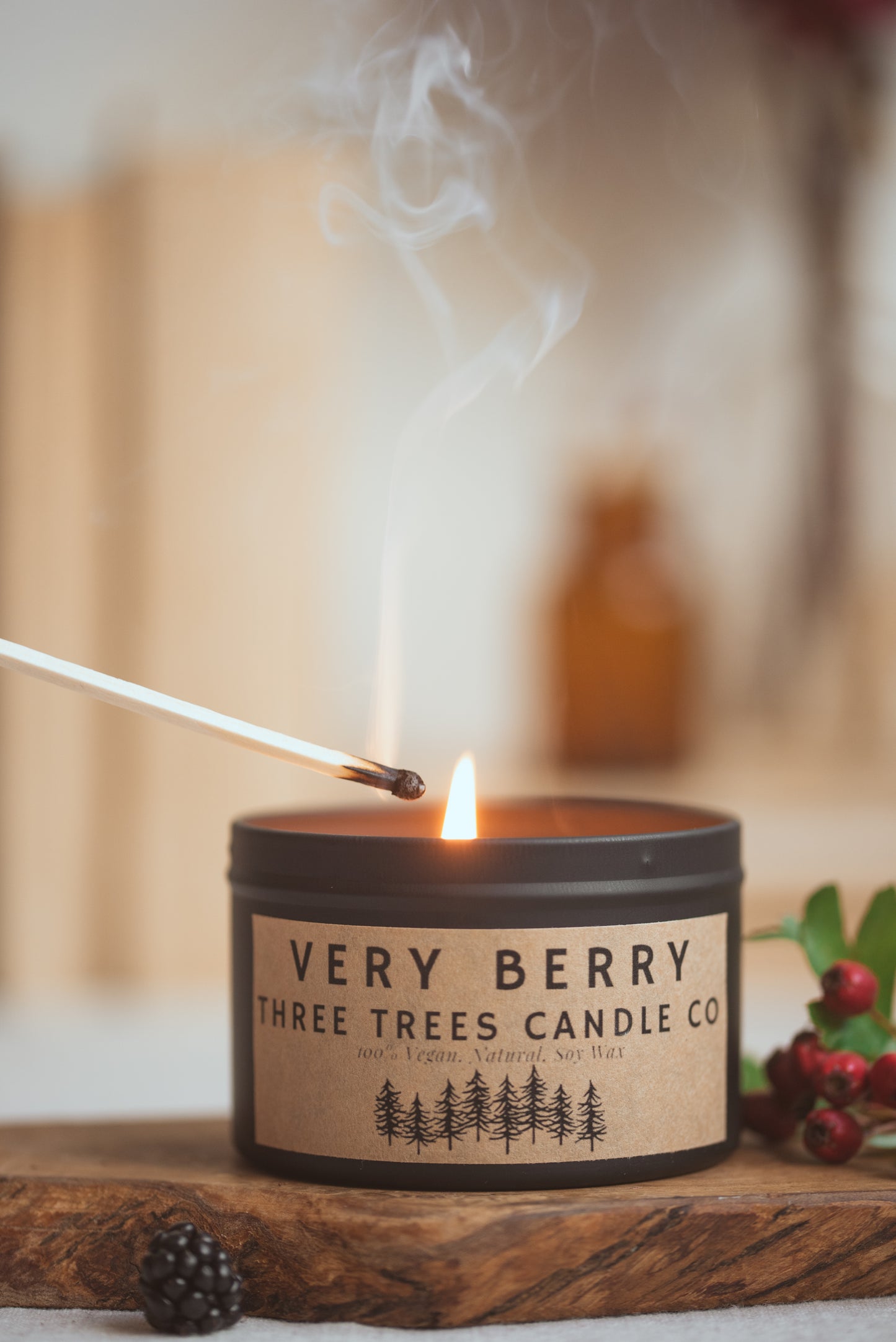 Front view of very berry scented candle