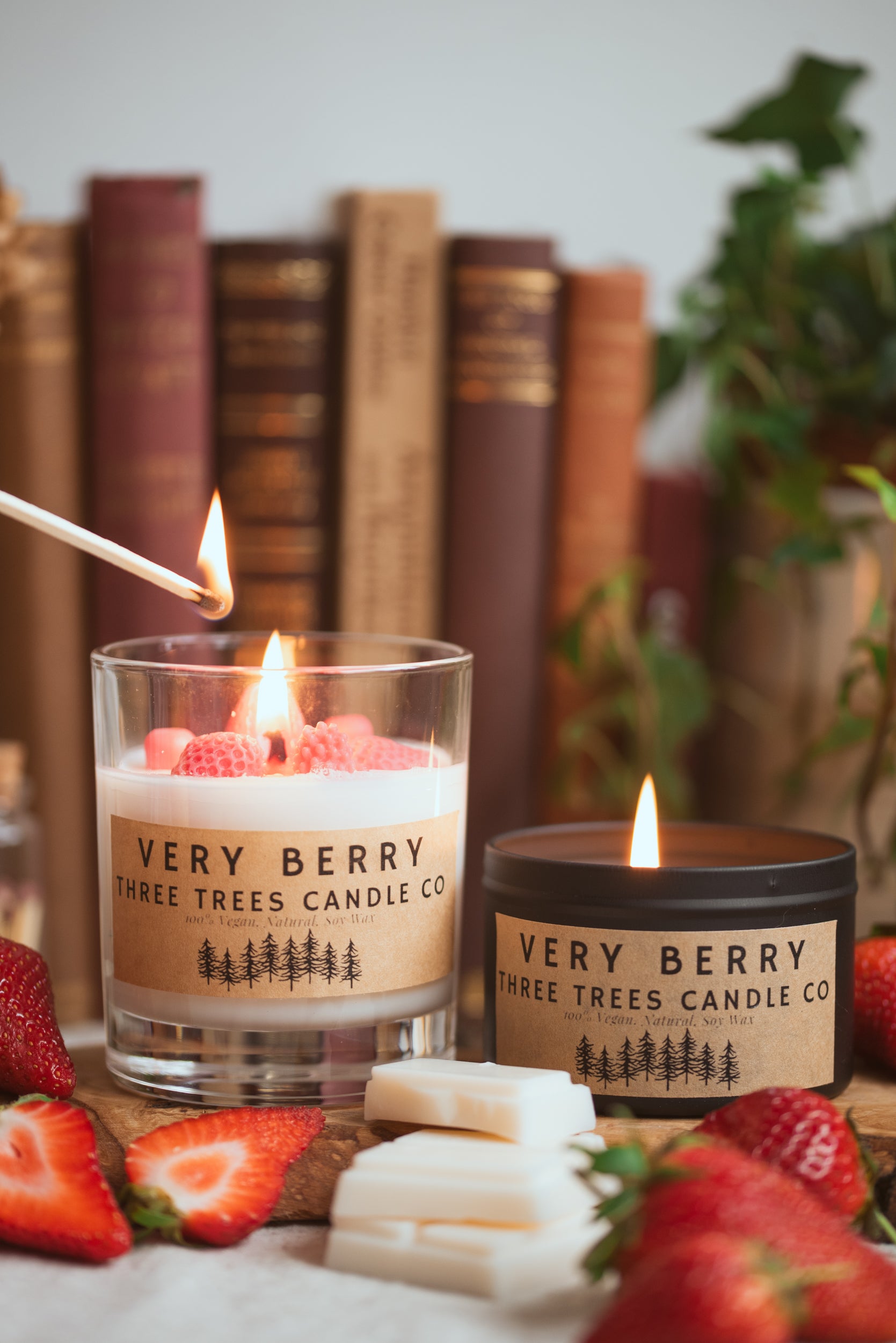 Very berry scented candle styled in a home setting