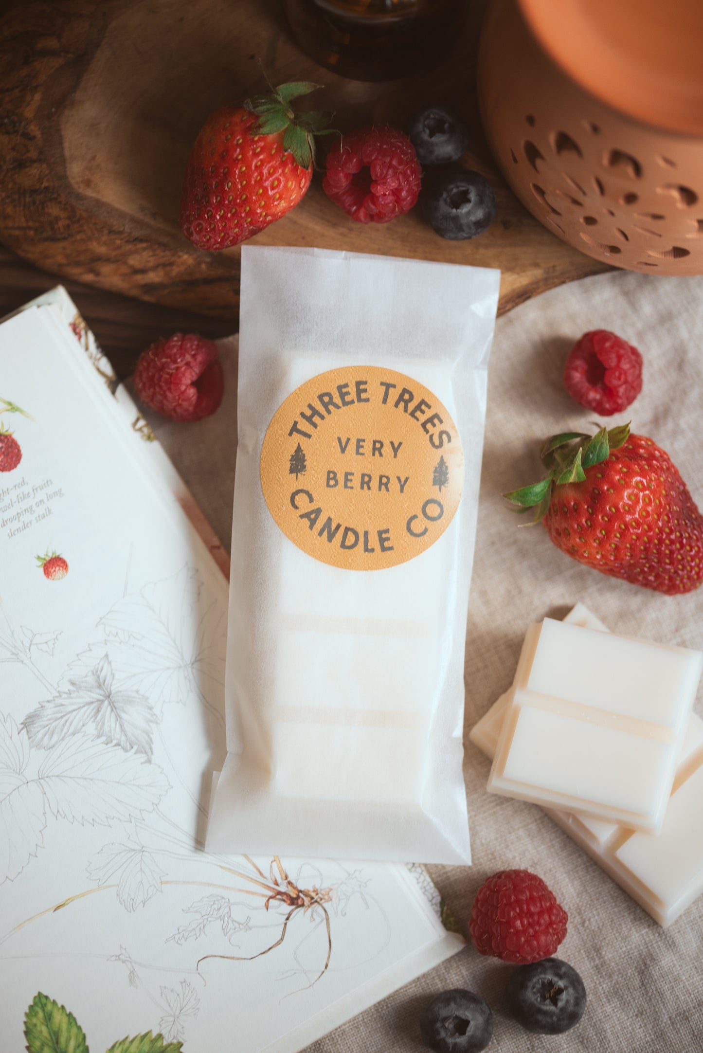 Close-up of very berry soy wax melt pieces