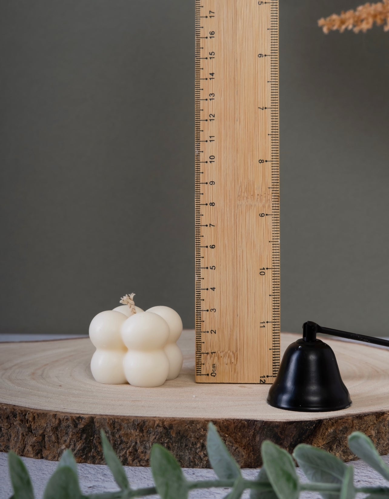 Close-up of bubble cube candle showing height small