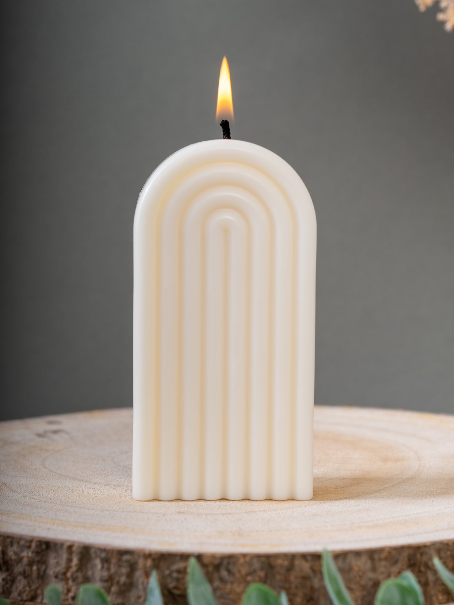 Close-up of arch rainbow candle